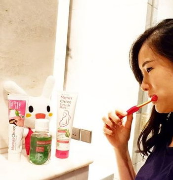 Mama Marlisa using Mama's Choice Natural Mouthwash