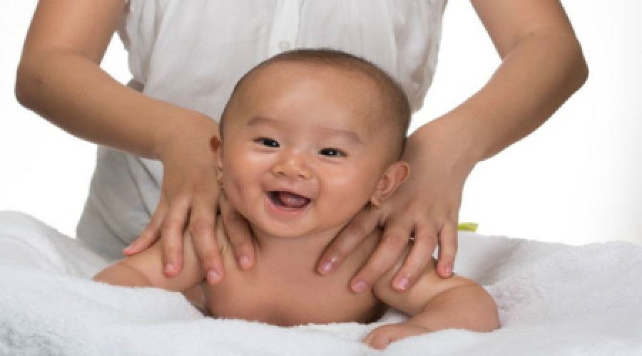 Which oil do you use to massage the baby?