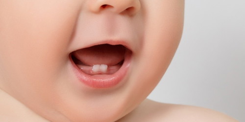 When did your baby's first tooth come?
