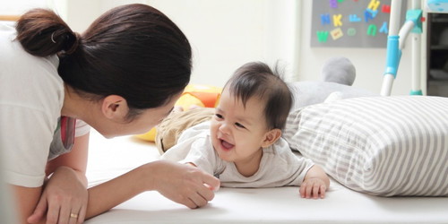 What is the best way to get your baby to smile?