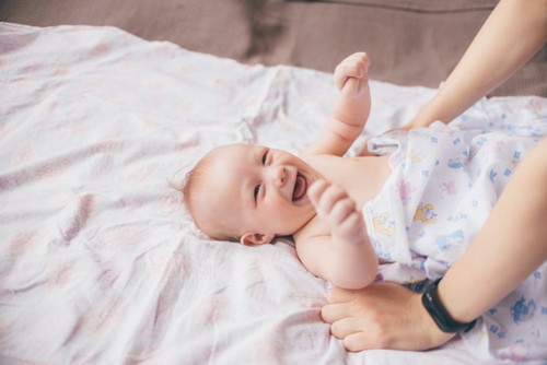 How do you make your baby smile?