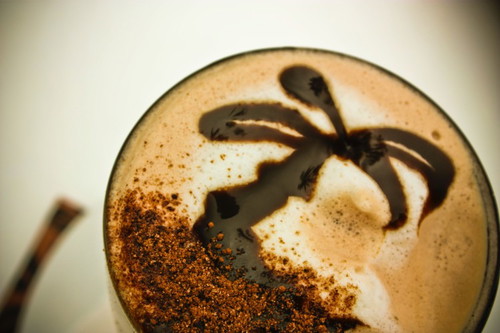Do you like coffee art? Share a picture of your coffee cup art with us.