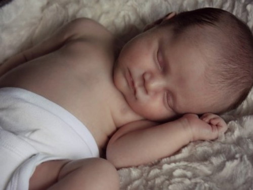How old did your baby start sleeping through the night?