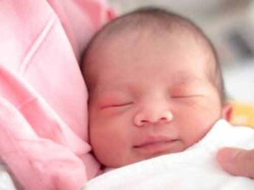 What age do babies start laughing?