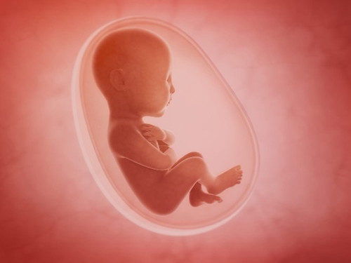 What is the colour of normal amniotic fluid?