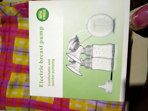 เครื่องปั้มนม