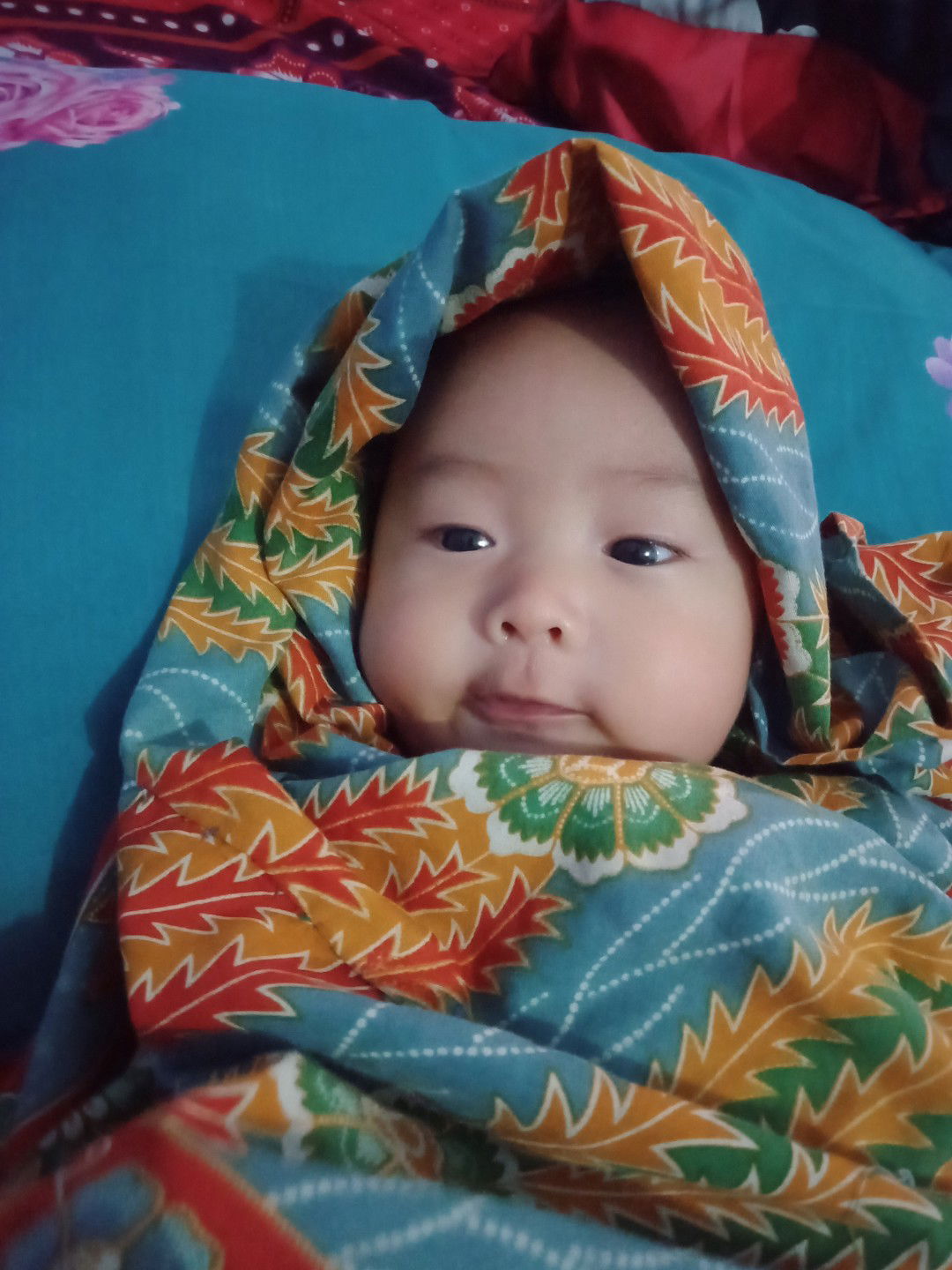 perkembangan anak usia 3 bulan