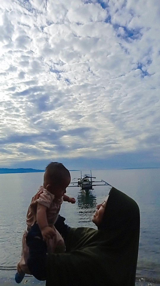 Suhartini profile icon