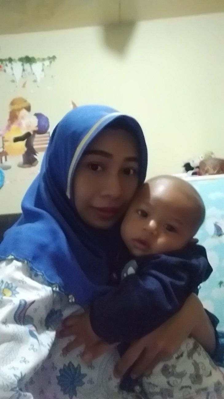 Emi Karunia profile icon