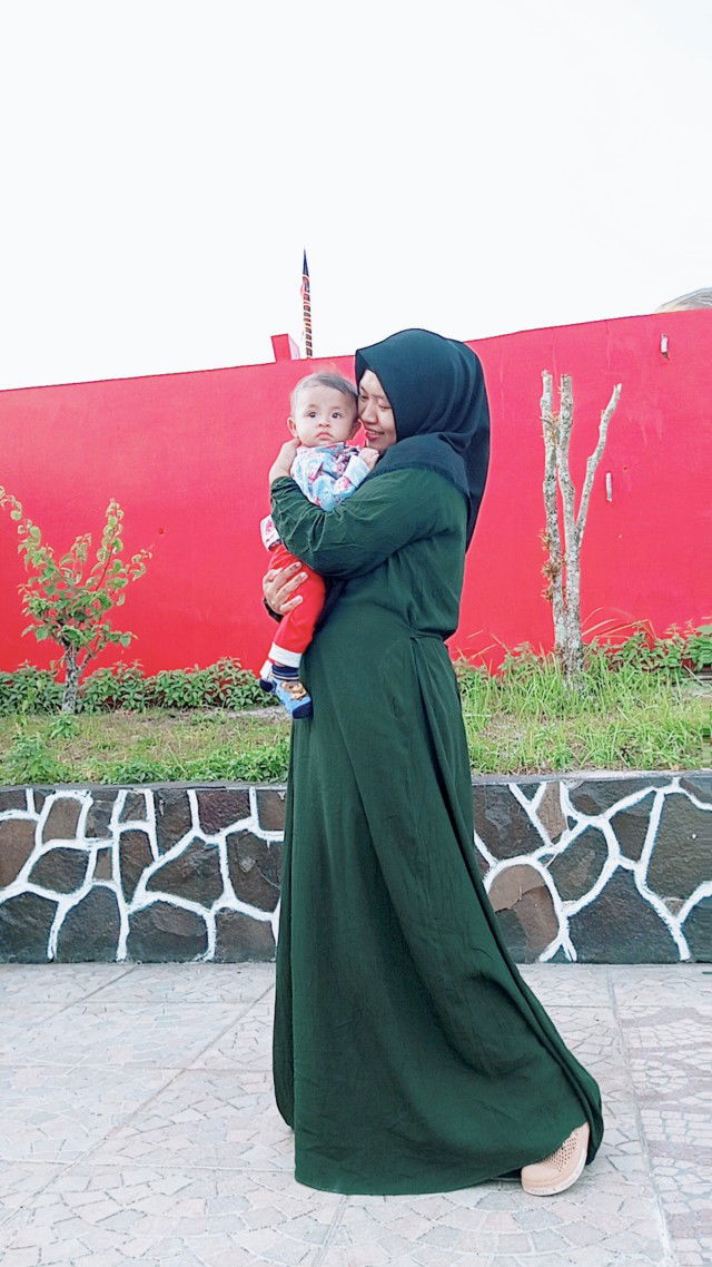 Arraudah Amira profile icon