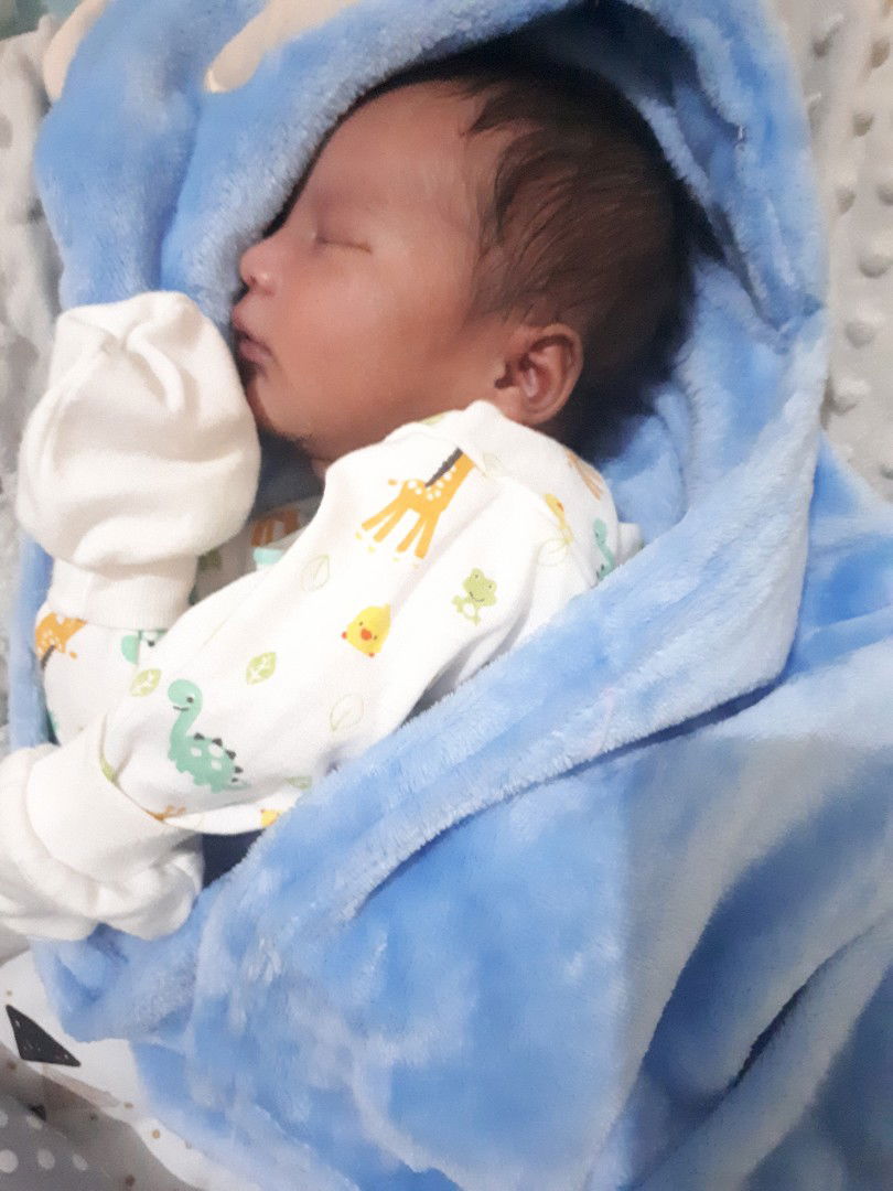 bayi 7 hari tidur miring