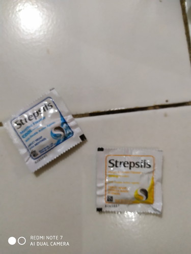 makan permen strepsil