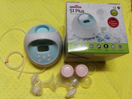 เครื่องปั้มนม