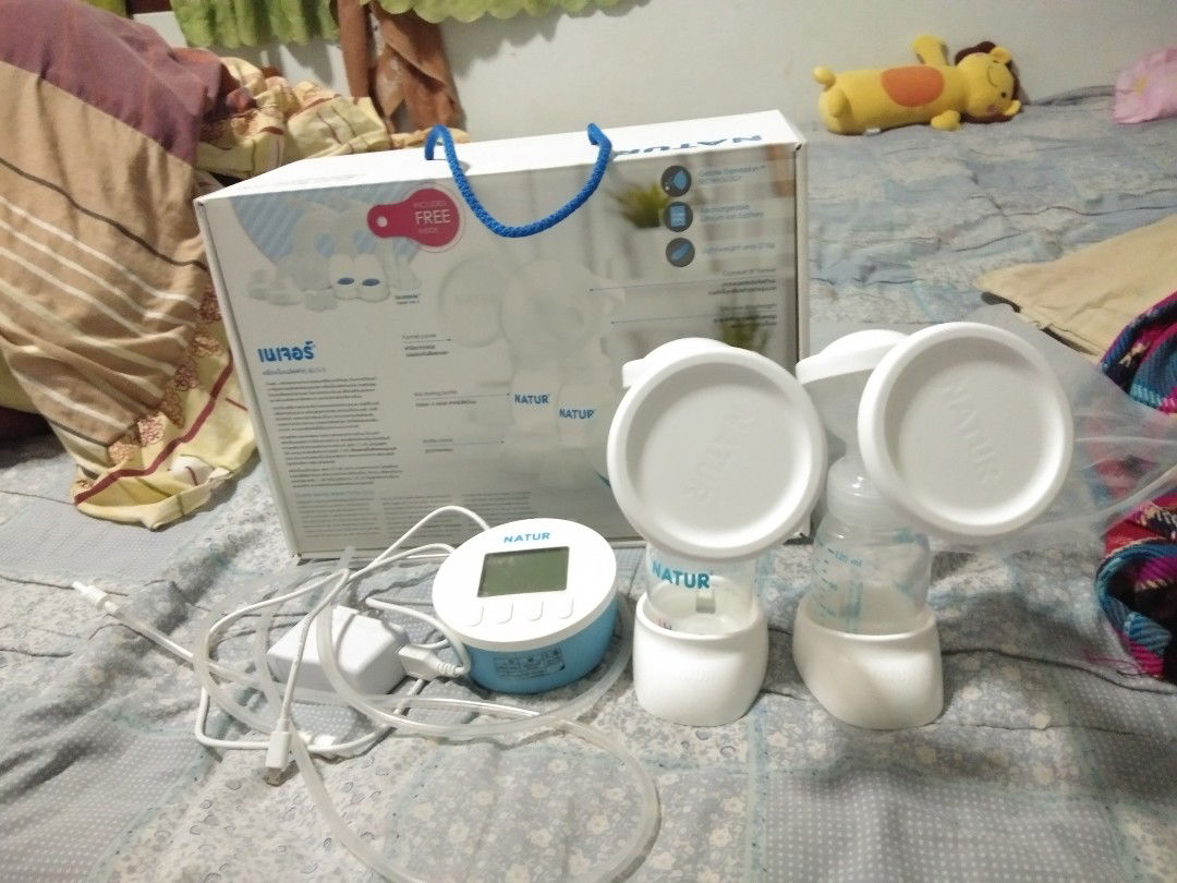 ขายเครื่องปั้มนม