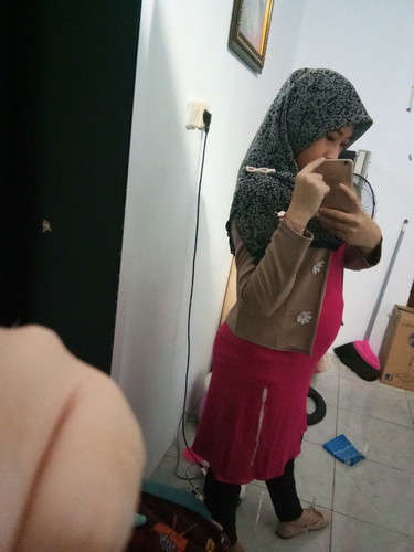 perut belum kelihatan