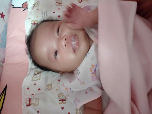 ลูกเป่าน้ำลายที่ปาก เป็นอะไรไหม