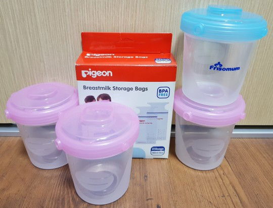 Selling this bundle of Friso Button-On Containers & Pigeon Storage Bags (new) @ $14