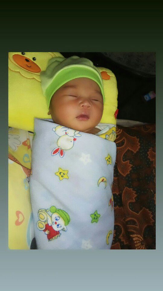 baby naik pesawat