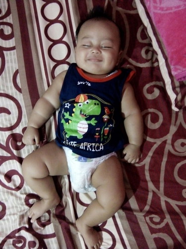 senyum senyum sendiri?