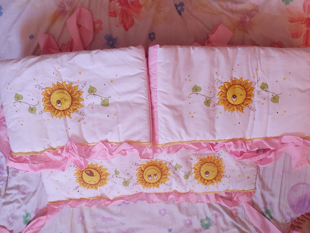 Pre-loved crib protector for baby girl