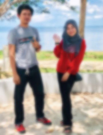 Tini Qhuzairi profile icon