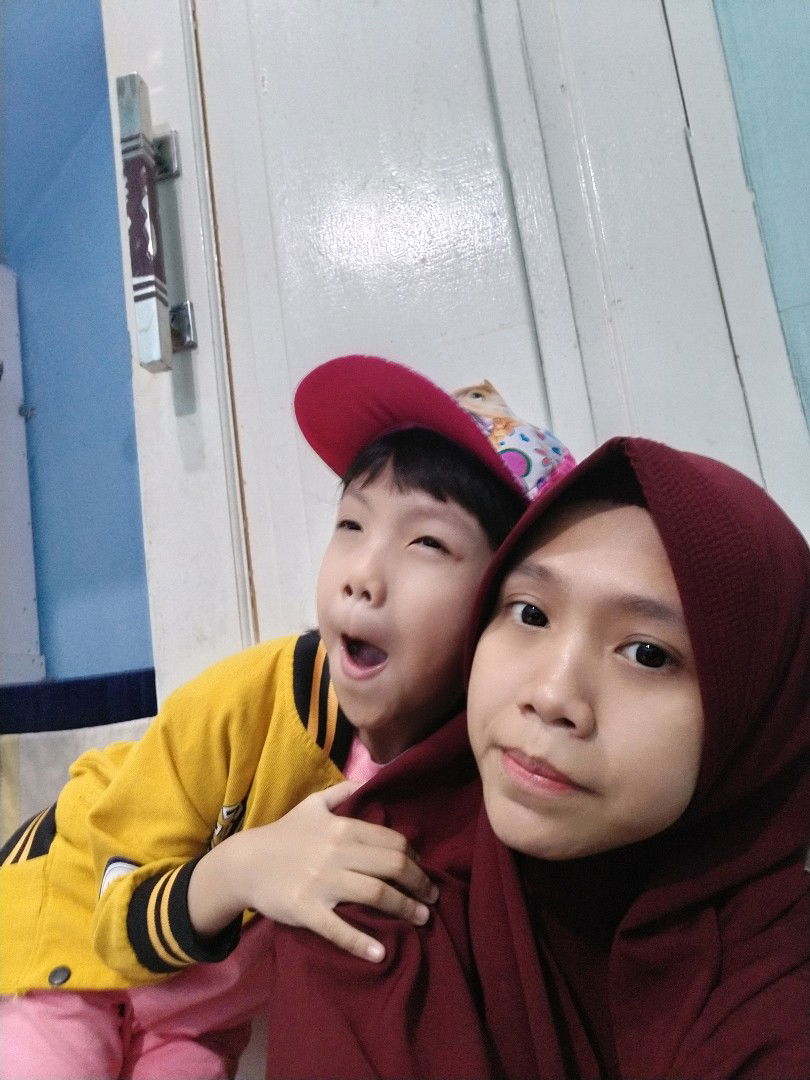 Tri Pujiyanti profile icon