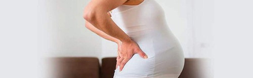 อะไรเป็นสาเหตุของอาการปวดหลังตอนท้อง