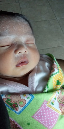 tindik telinga bayi