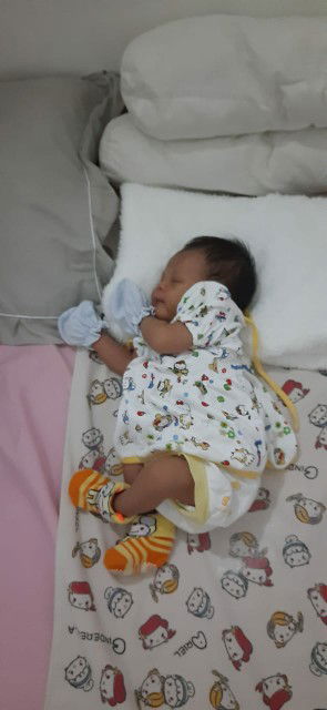 baby tidur miring