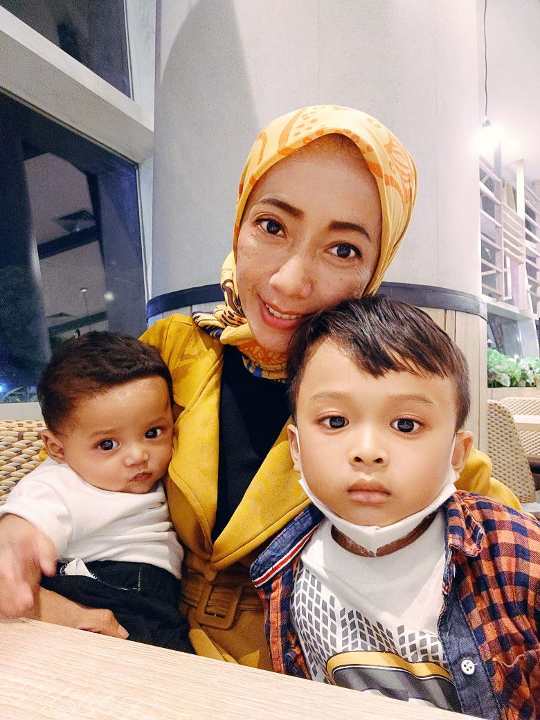 Yusi Isnawati profile icon