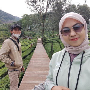 Tini Mulyani profile icon