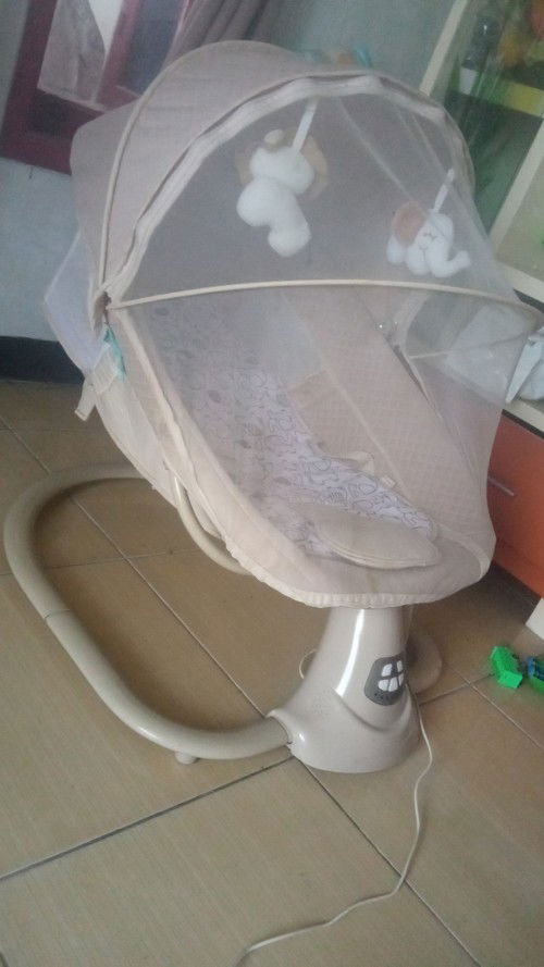 Preloved baby swing