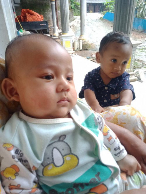 Bayi belum miring