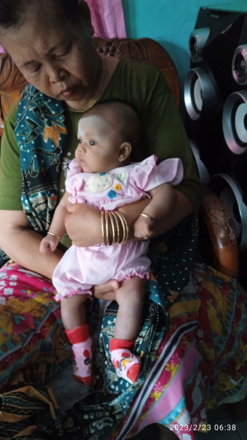 Cara menggendong bayi