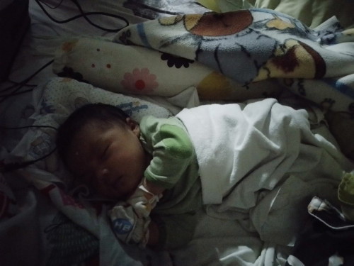 NEWBORN SLEEPING POSITION