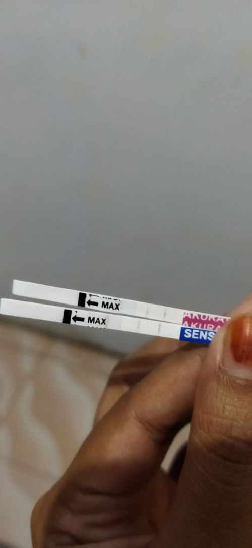 Assalamu'alaikum bund, menurut bunda" Apakah foto ini garis dua  bund? Kalau iya kenapa bisa samar?