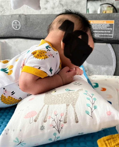 Tummy time using pillow?