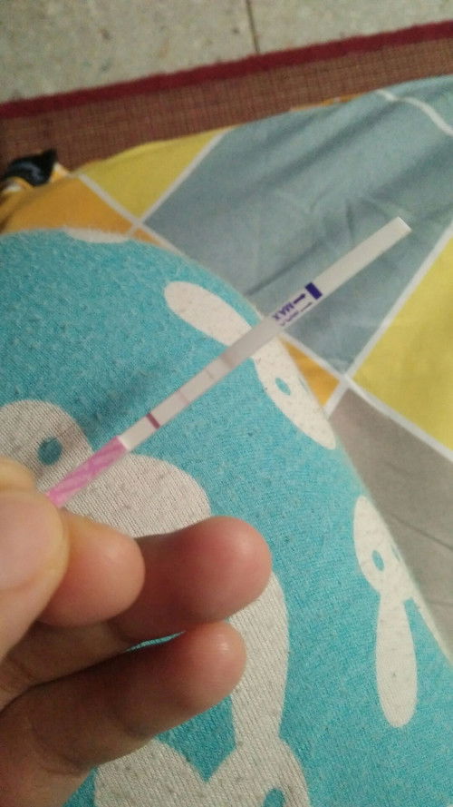 Tespek garis dua nya yg satu agak samar