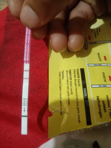 Bun mau nanya nih kan telat 1 Minggu pas di tespek hasilnya garis 2 ini beneran hamil kan yah.......