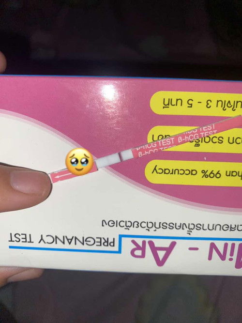 อยากทราบว่าตรวจครรภ์ขึ้น2ขีดจางๆแบบนี้ท้องมั้ยค่ะ