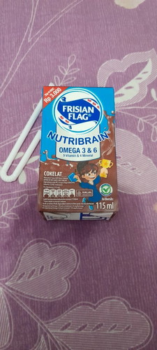 Minum susu frisin flag