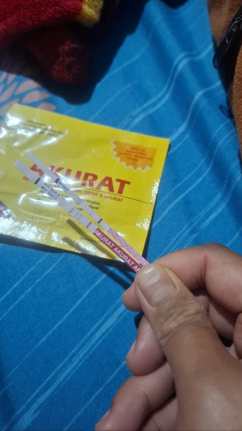 Tespek garis samar sebelum haid