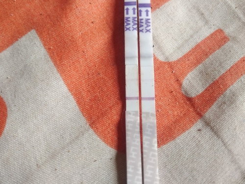 ขึ้น​2ขีดจางๆท้องมั้ย