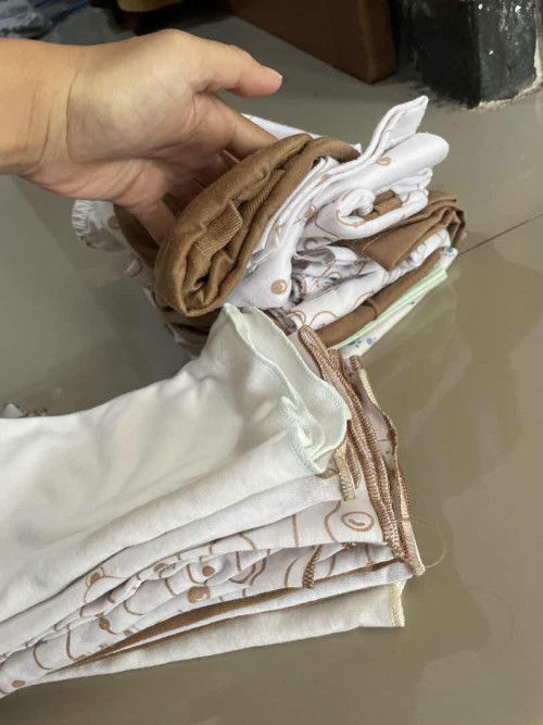 Yang Mengendaki Baju Bayi