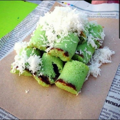 NGIDAM KUE PUTU