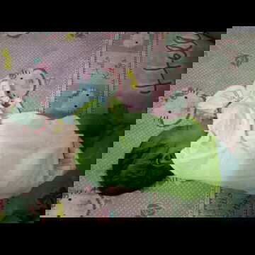 usia  bayi tidur miring