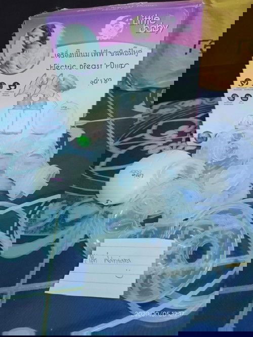 เครื่องปั้มนม