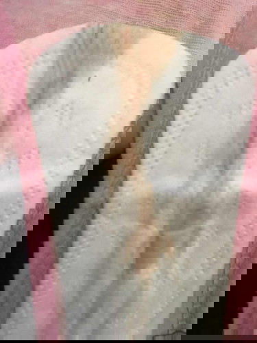 light brown/pink discharge