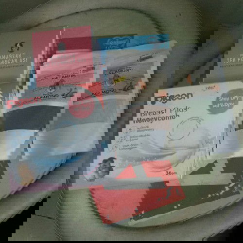 1 set breast pads & asi booster