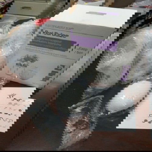 Preloved electric automatic breastpump with free 10pcs milk storage bag